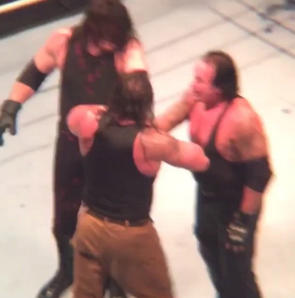 Undertaker and Kane Double chokeslam on Braun Strowman