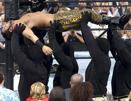 Daivari-carried-away-by-Terrorists-on-SmackDown.jpg