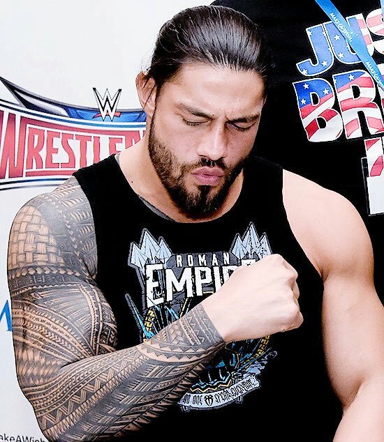 Burned Letter L on Roman Reigns' right arm