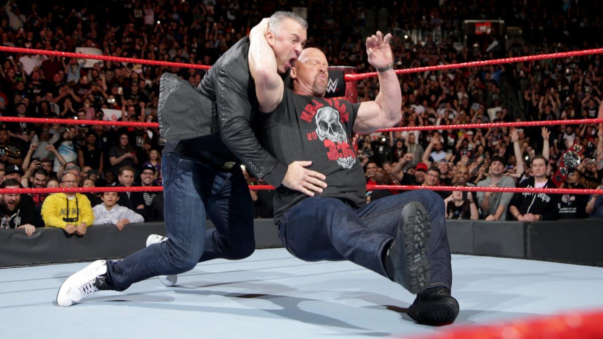 Stone Cold Steve Austin hits a Stone Cold Stunner on Shane McMahon at Raw 25