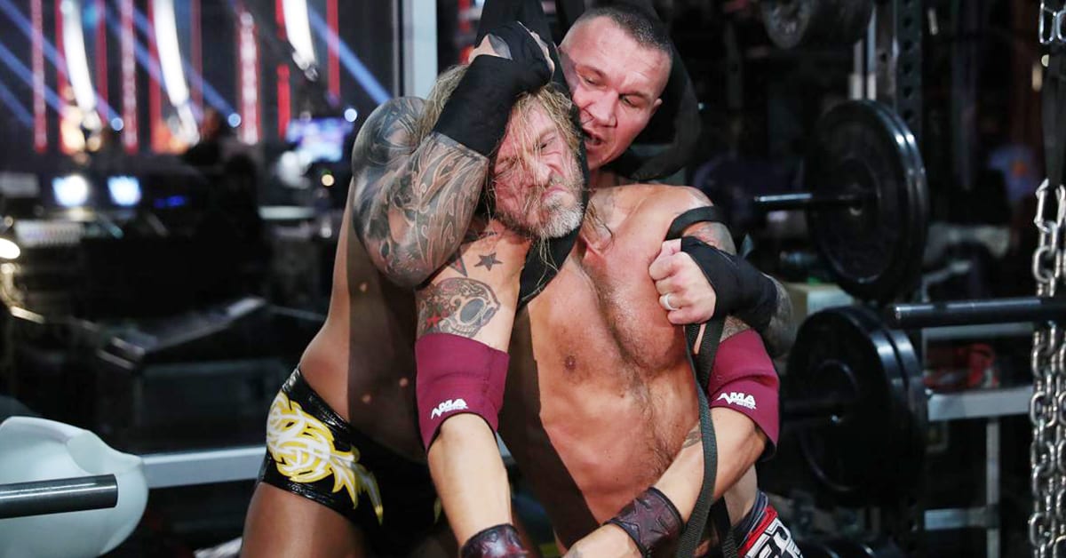 Randy Orton wraps weight-lifting equipment around Edge's neck during Last Man Standing match at WrestleMania 36