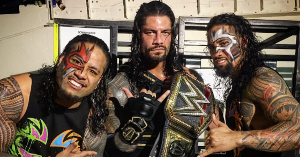 The Usos Roman Reigns WWE World Heavyweight Champion