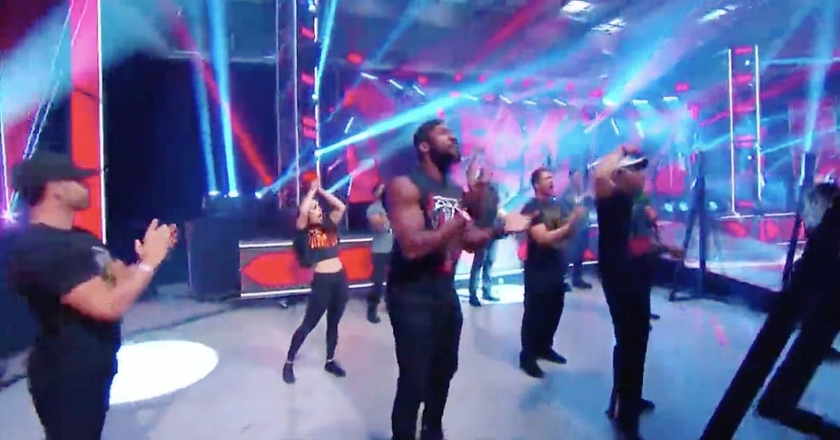 WWE Performance Center Trainees Standing As Fans In The Crowd On RAW 2020