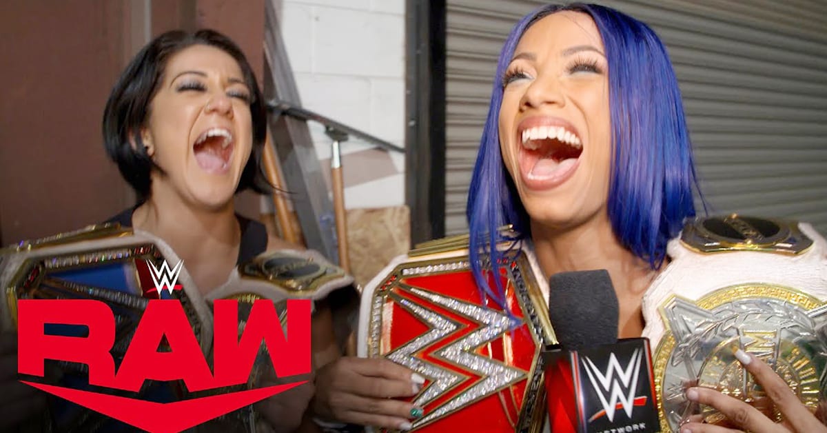 WWE Women's Tag Team Champions SmackDown Women's Champion Bayley RAW Women's Champion Sasha Banks Laughing
