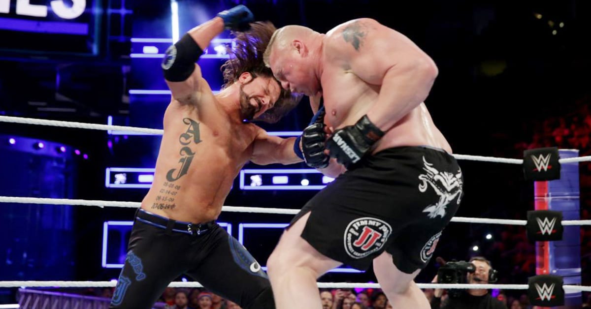 AJ Styles Punches Brock Lesnar WWE Survivor Series 2017