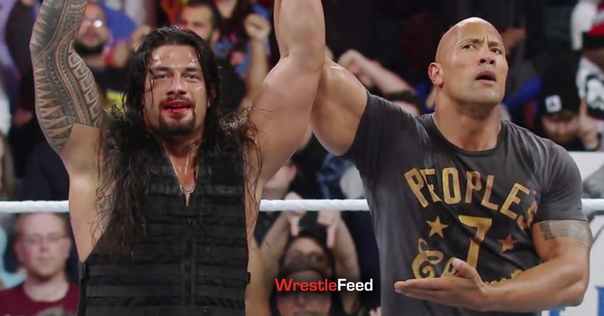 The-Rock-Raises-Roman-Reigns-Hand-At-WWE-Royal-Rumble-2015.jpg