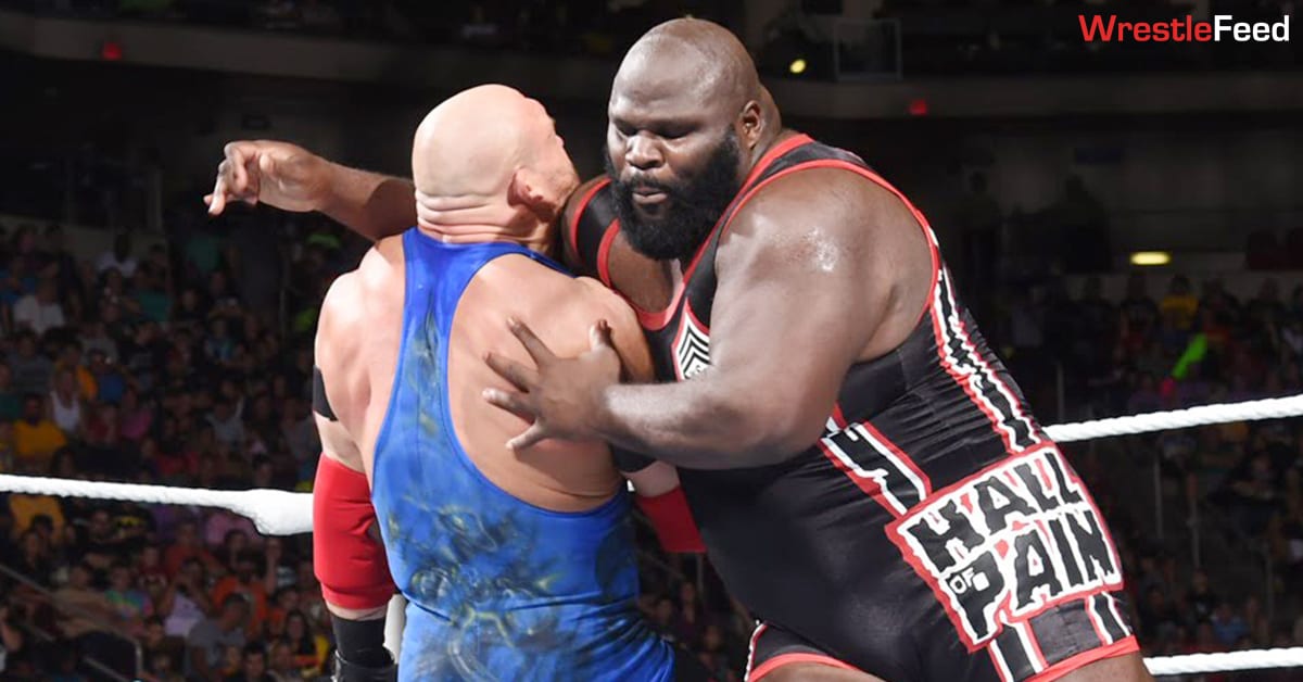 Mark-Henry-Clotheslines-Ryback-WWE-SmackDown-2015-WrestleFeed-App.jpg