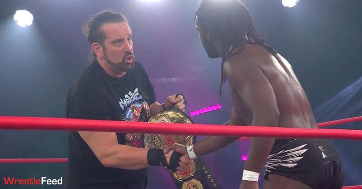 Tommy Dreamer with the Impact World Championship at No Surrender 2021 WrestleFeed App