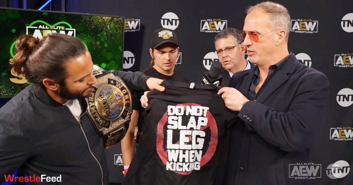 Don Callis Gives The Young Bucks Do Not Slap Leg When Kicking T-Shirt On AEW Dynamite WrestleFeed App