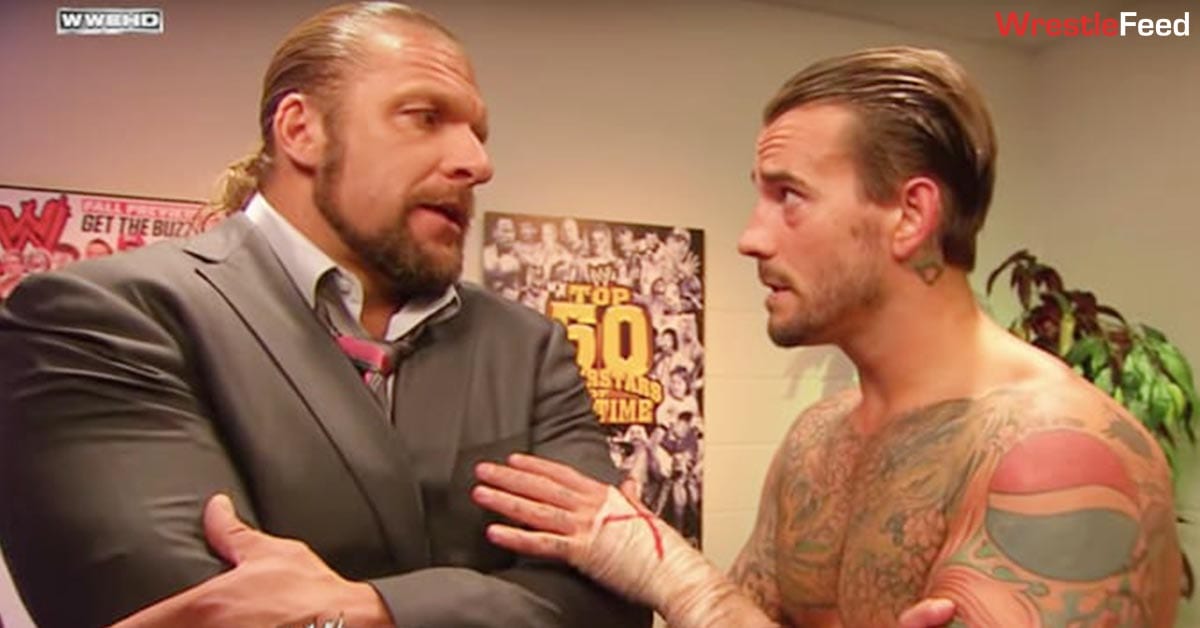 Triple-H-CM-Punk-Talking-Backstage-In-WWE-WrestleFeed-App.jpg