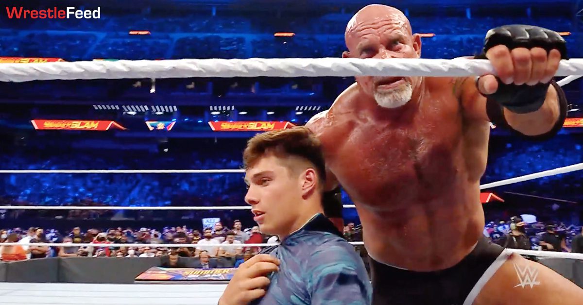 Goldberg chokes his son Gage with his shirt in the ring at WWE SummerSlam 2021 WrestleFeed App