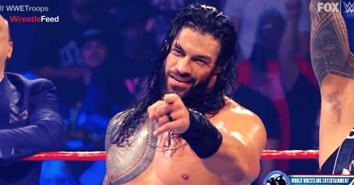 Roman-Reigns-Pointing-A-Finger-At-Fans-Happy-Smiling-Face-Smirk-WWE-Tribute-To-The-Troops-2021-WrestleFeed-App.png