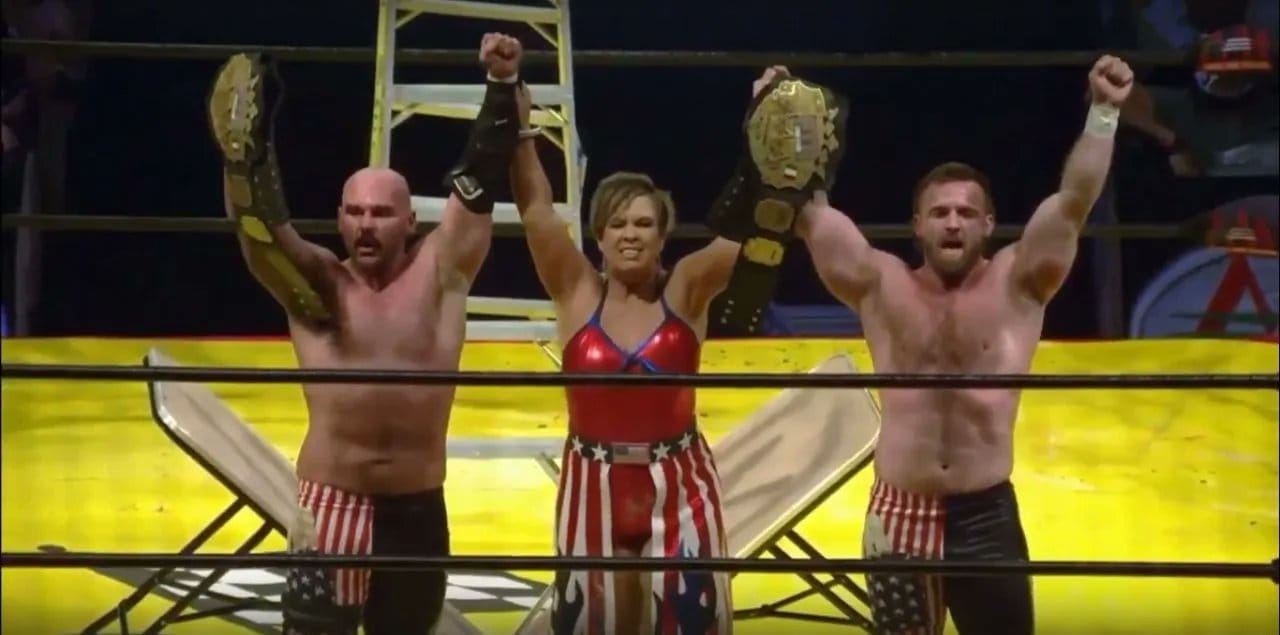 Vickie Guerrero with AAA Tag Team Champions FTR TripleMania Regia II