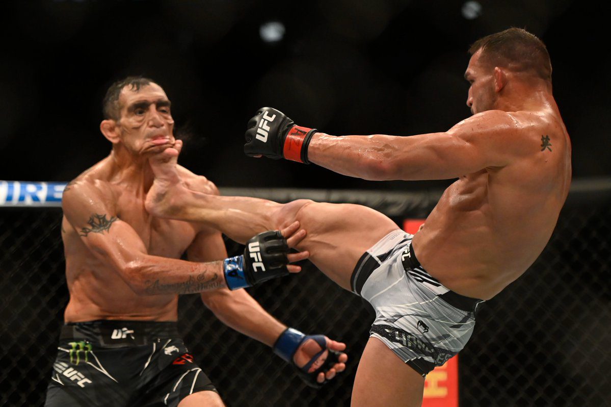 Michael Chandler knocks out Tony Ferguson head front kick weird old face UFC 274