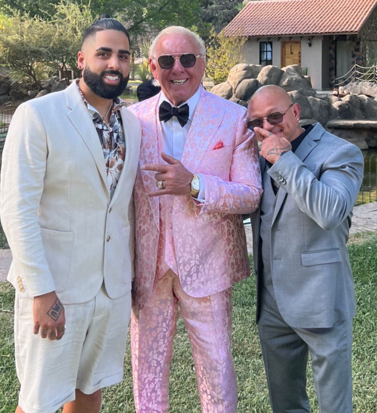 Unmasked Rey Mysterio with Ric Flair at Charlotte Flair Andrade El Idolo Wedding