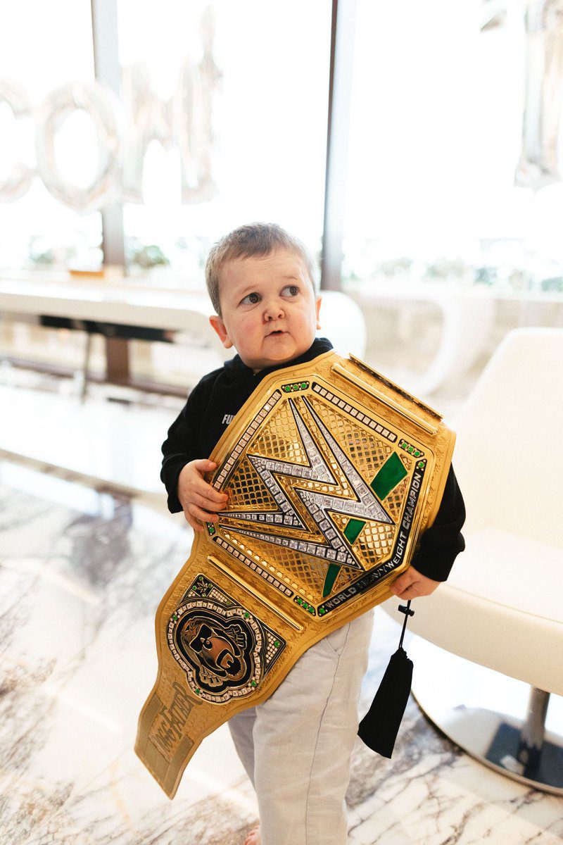 Hasbulla with golden WWE Championship title belt