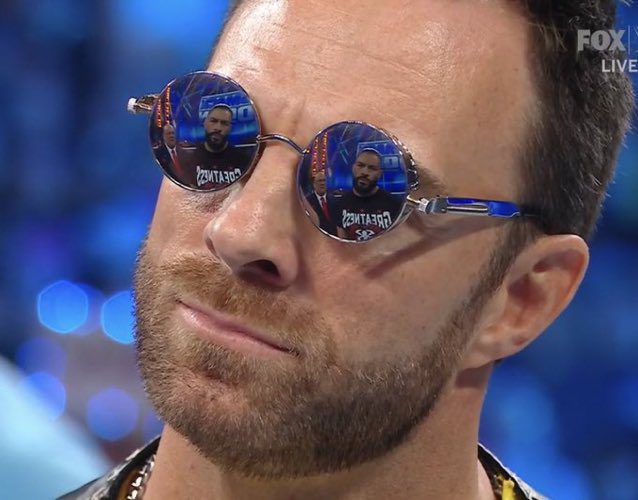 Roman Reigns Reflection In LA Knight Glasses