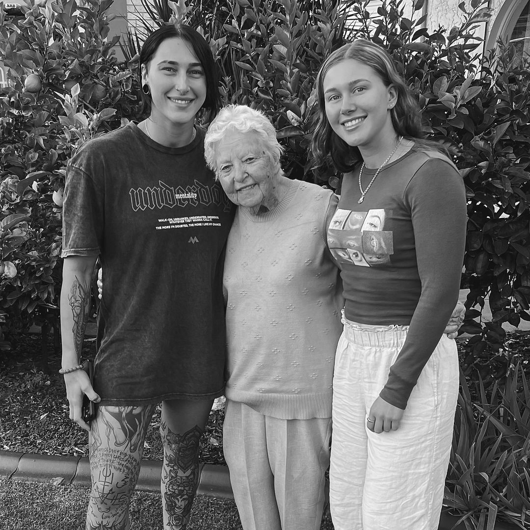 Rhea Ripley with her grandmother and younger sister Calista
