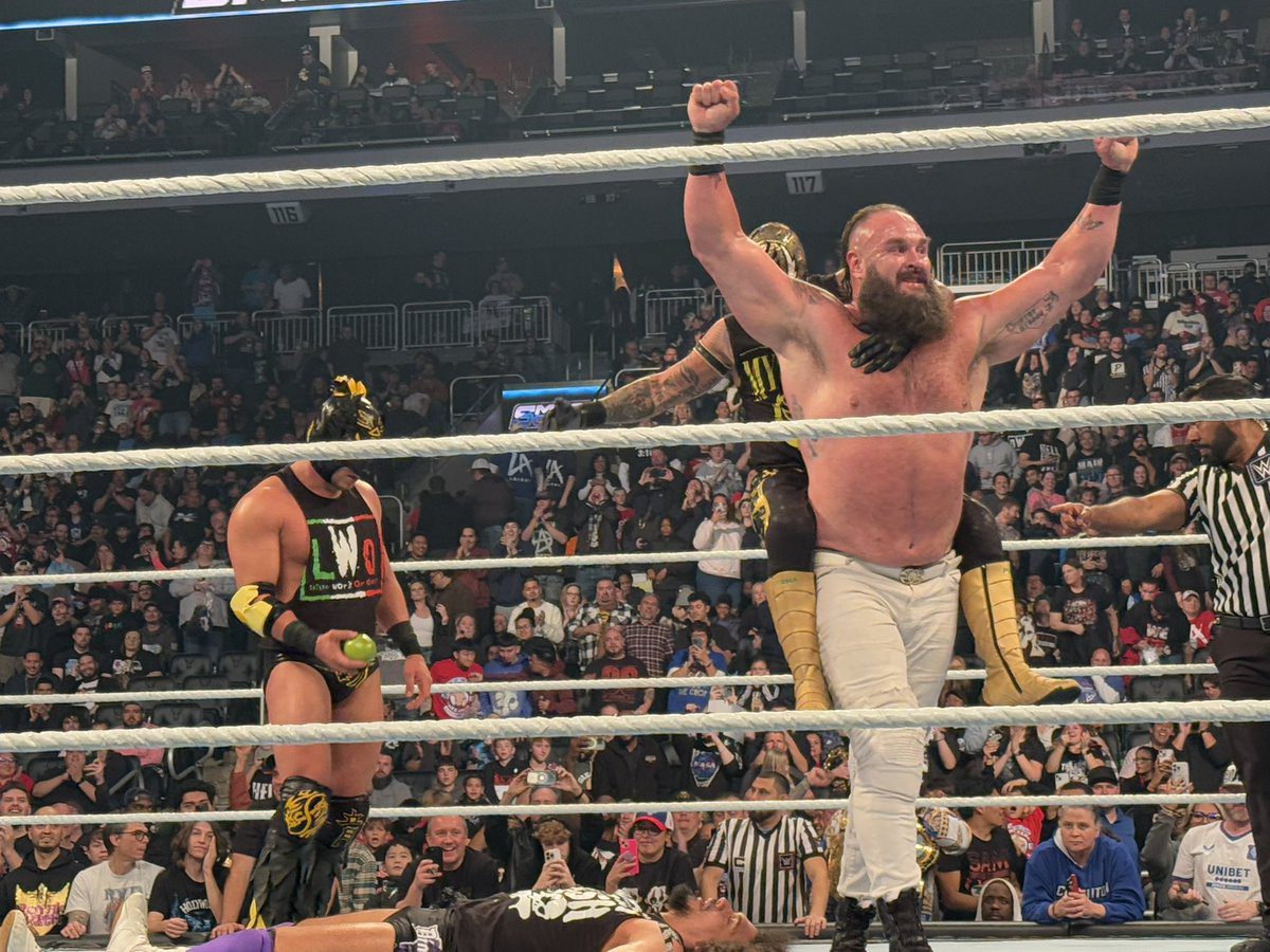 Braun Strowman with Rey Mysterio and Dragon Lee of LWO