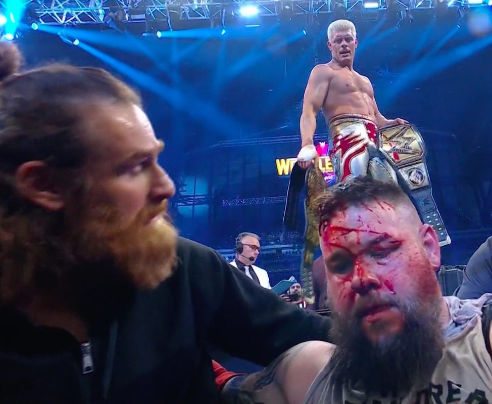 Sami Zayn Cody Rhodes Kevin Owens Bleeding Busted Open Blood WWE Royal Rumble 2025 WrestleFeed App