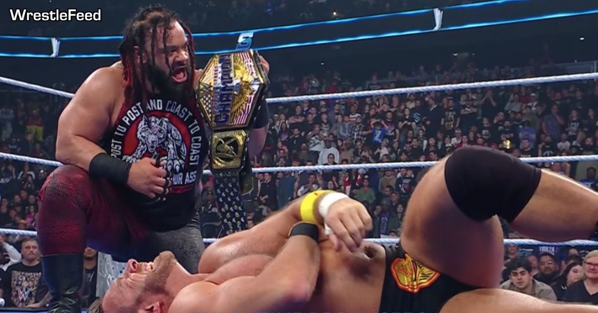 Jacob Fatu posing with the United States Championship in front of LA Knight WWE SmackDown April 11 2025 WrestleFeed App