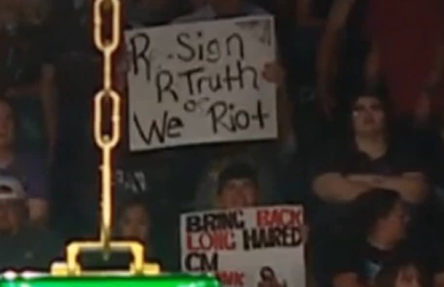 Re-Sign R-Truth or We Riot sign WWE RAW June 2 2025