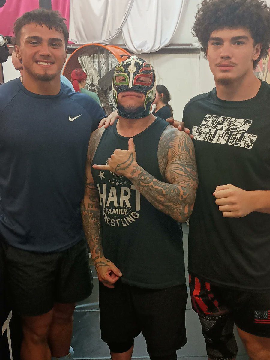Tatanka sons with Rey Mysterio