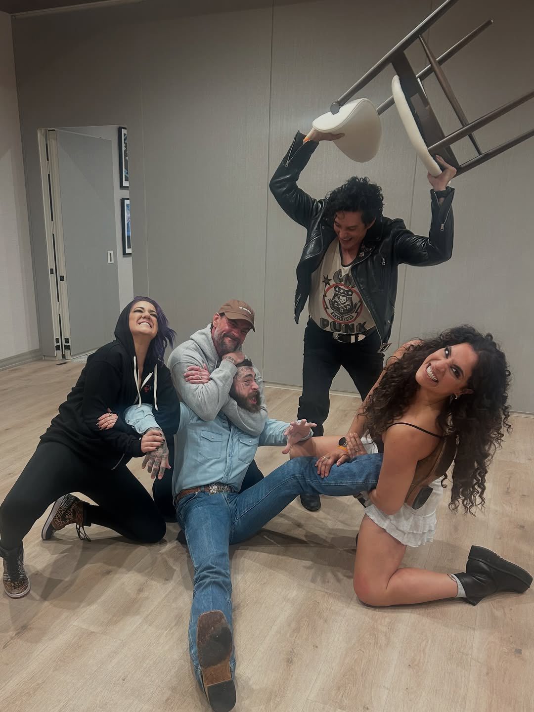 Post Malone attacked by CM Punk Bayley Raquel Rodriguez WWE Saturday Night's Main Event Backstage November 1 2025