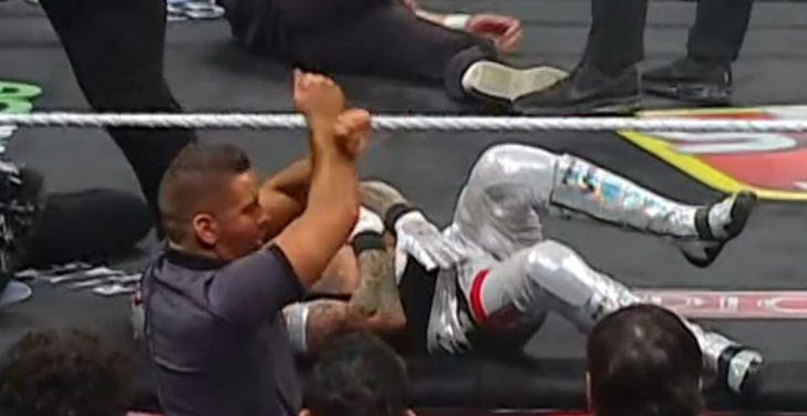 WWE Referee X sign for injury