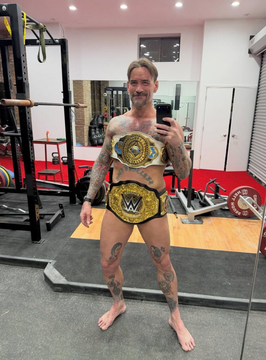 CM Punk Naked with World Heavyweight Championship and Women's Intercontinental Championship After WWE Elimination Chamber 2026
